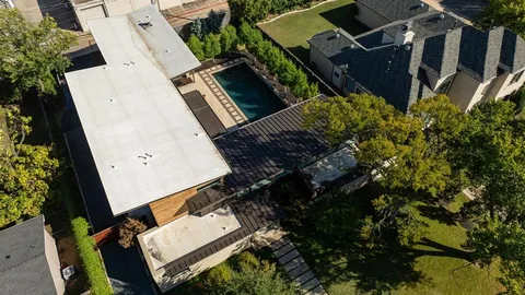 an aerial view of residential house with outdoor space