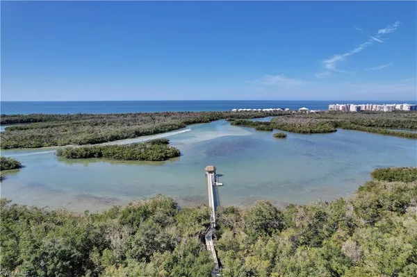 a view of an ocean and city