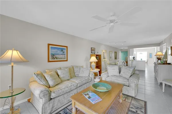 a living room with furniture and a table