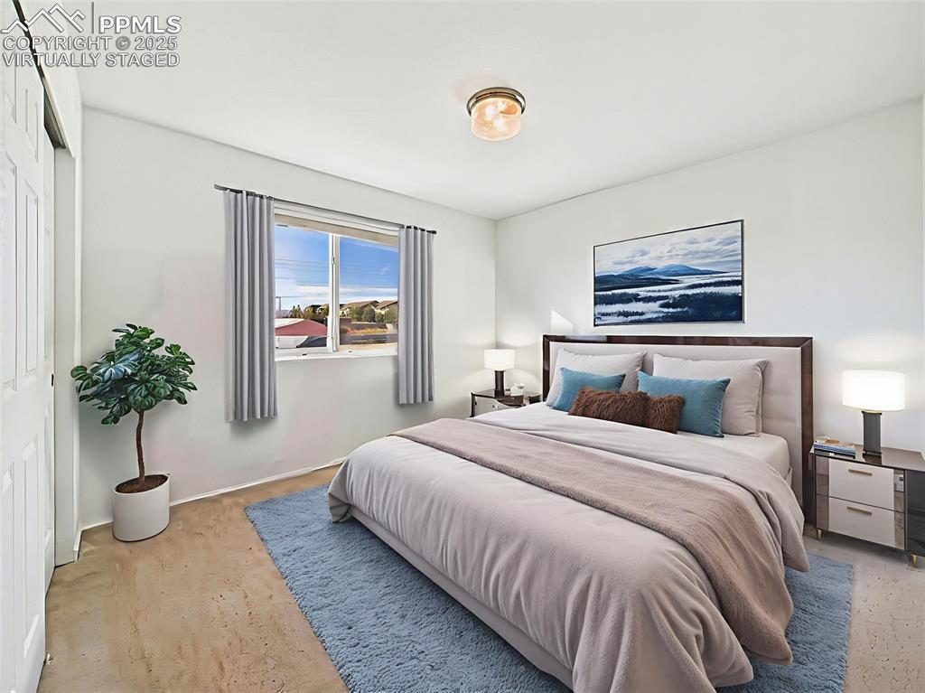 6272 Anders Ridge Lane Colorado Springs, CO 80927 - Photo 34 of 50 virtually staged room highlights how easily this space can be transformed into a stylish guest retreat or additional bedroom.