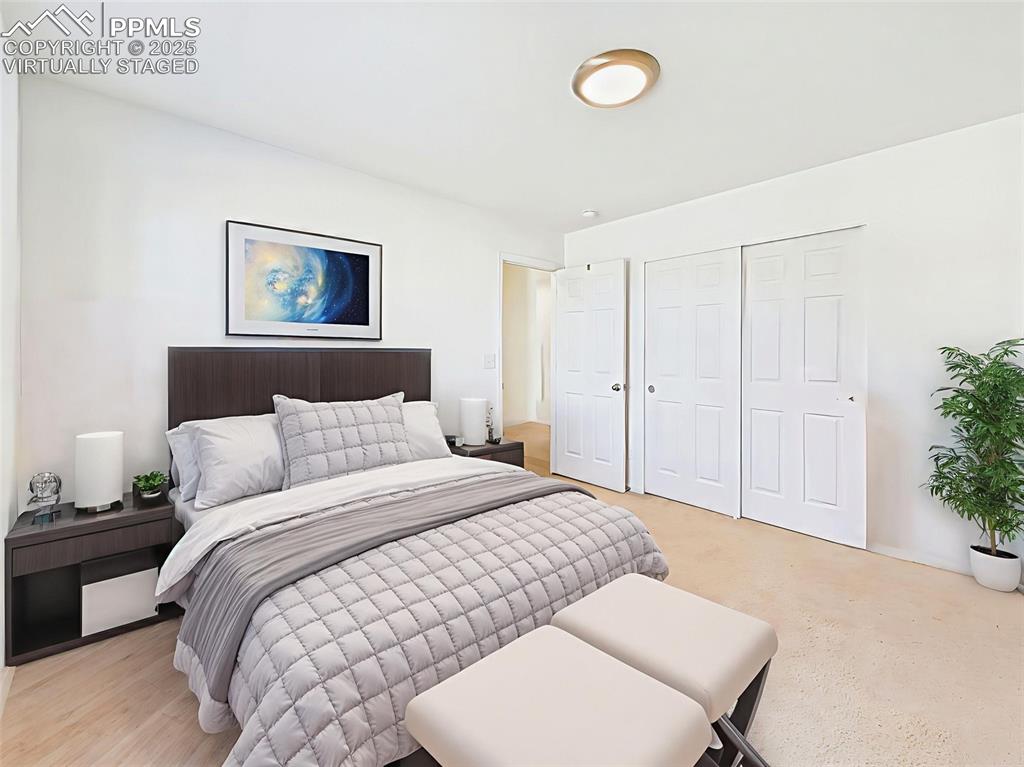 6272 Anders Ridge Lane Colorado Springs, CO 80927 - Photo 36 of 50 Virtually staged for inspiration — this secondary bedroom features a full double-door closet