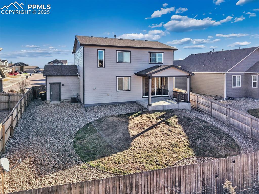 6272 Anders Ridge Lane Colorado Springs, CO 80927 - Photo 45 of 50 Generous yard space extends around the home, with private fencing and a wide side yard ideal to make this your home.