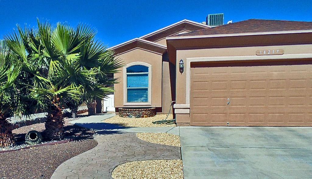 14217 North Point Avenue El Paso, TX 79938 - Photo 1 of 1 a front view of a house with a yard