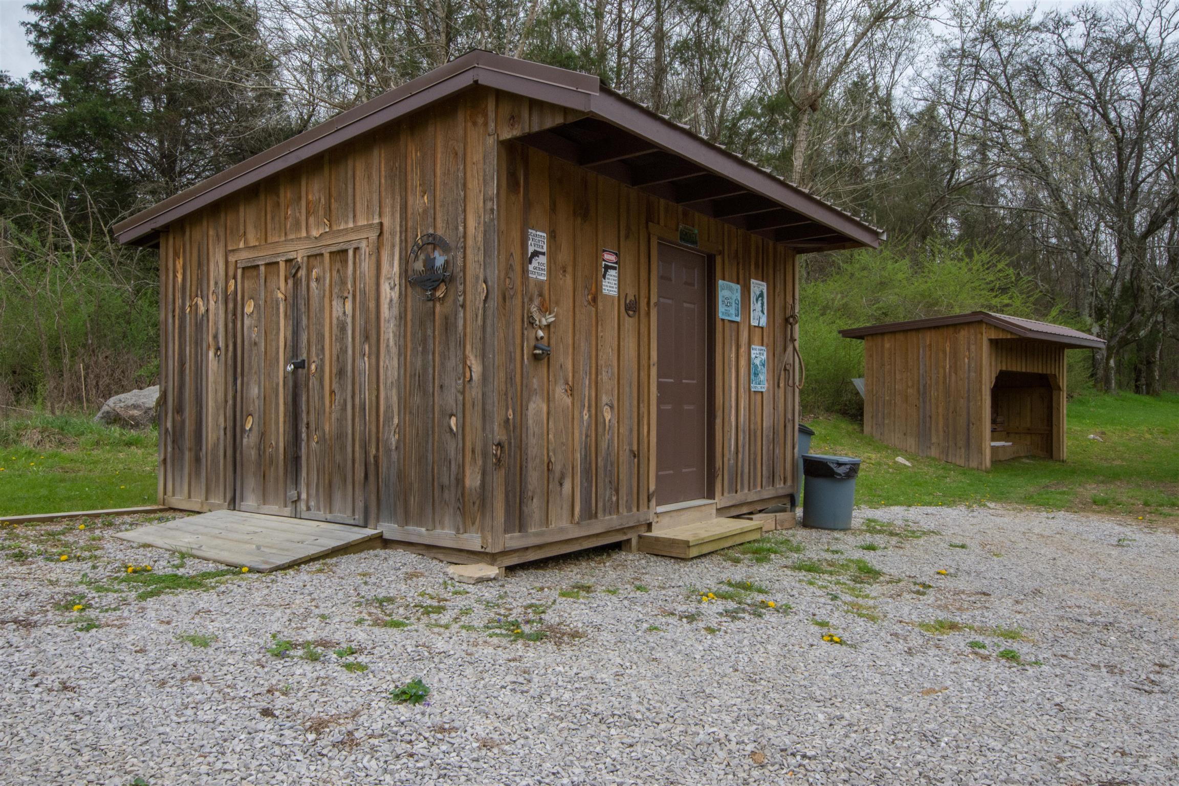 2211 Poplar Hill Road Prospect, TN 38477 - Photo 4 of 30 a wooden house with a outdoor space