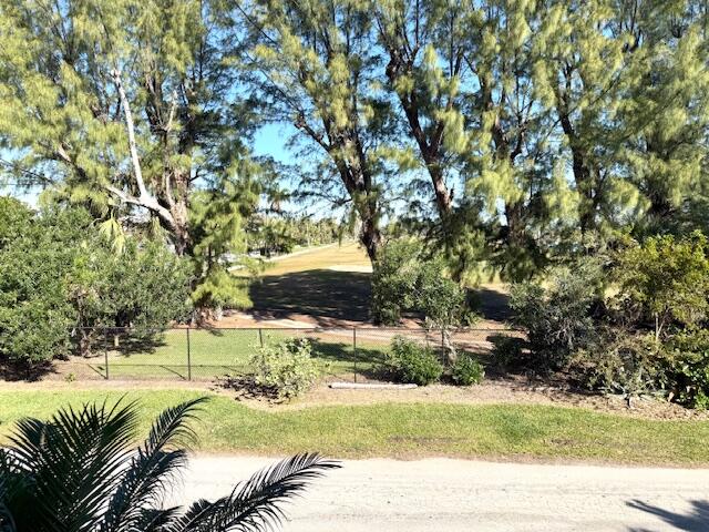 131 North Golfview Road, Unit 4 Lake Worth Beach, FL 33460 - Photo 13 of 13 a view of a house with a yard