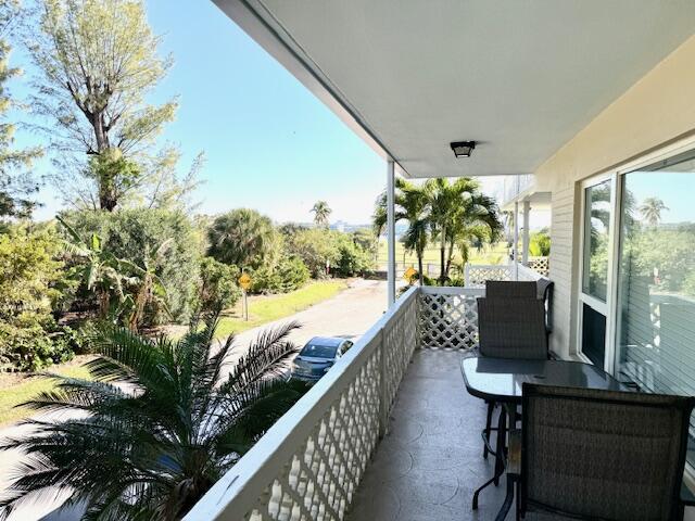131 North Golfview Road, Unit 4 Lake Worth Beach, FL 33460 - Photo 4 of 13 a view of balcony with furniture