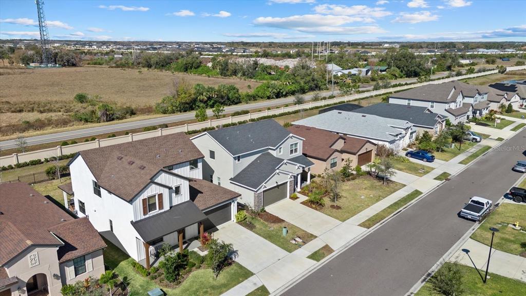 8330 Abalone Loop Palmetto, FL 34221 - Photo 39 of 45 an aerial view of a house with a garden