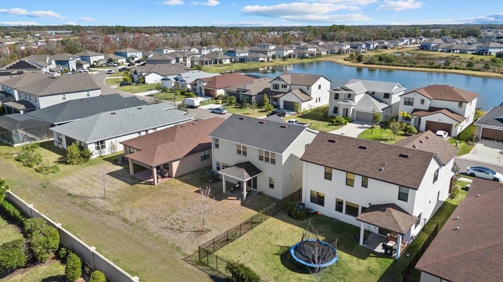 8330 Abalone Loop Palmetto, FL 34221 - Photo 43 of 45 an aerial view of a house with garden space and ocean view