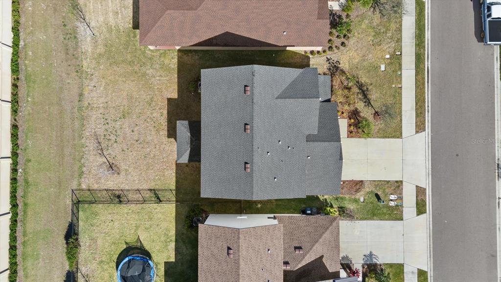 8330 Abalone Loop Palmetto, FL 34221 - Photo 44 of 45 an aerial view of a house with a backyard space