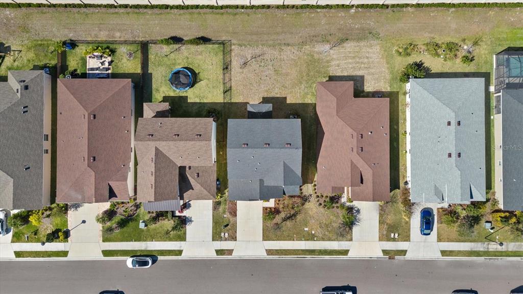 8330 Abalone Loop Palmetto, FL 34221 - Photo 45 of 45 an aerial view of waterside residential houses with outdoor space