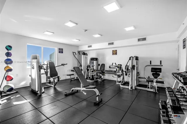 a view of a room with gym equipment