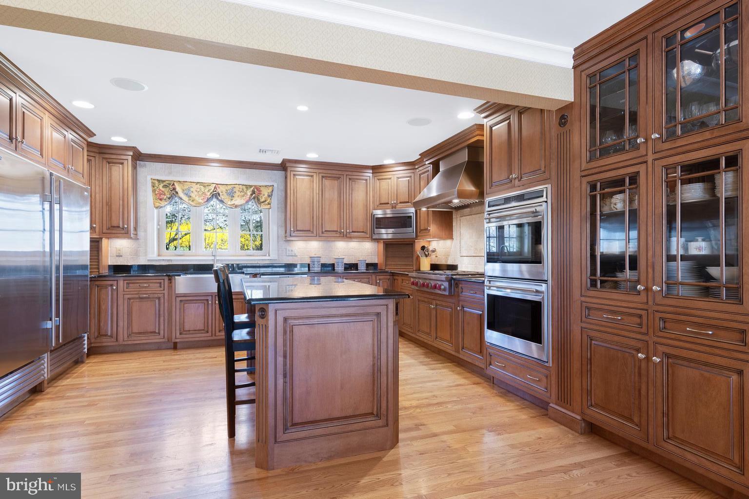 1345 Waverly Road Gladwyne, PA 19035 - Photo 13 of 51 Amish-made custom cabinets & granite counters