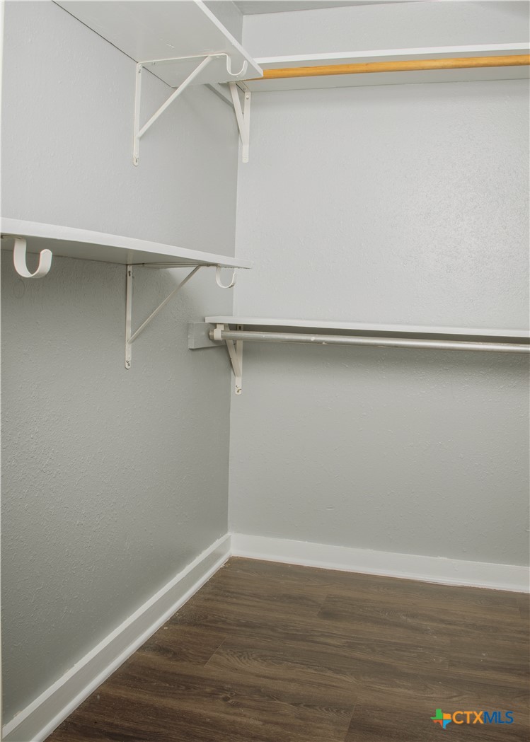 1407 South 7th Street Temple, TX 76504 - Photo 23 of 36 a view of an empty walk in closet