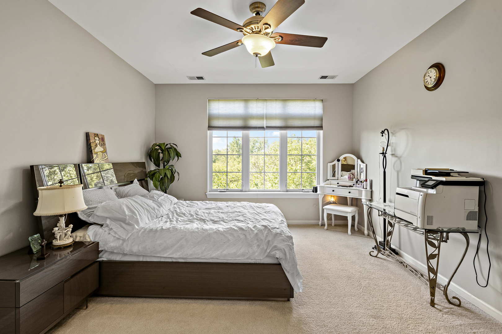 660 McHenry Road, Unit 306 Wheeling, IL 60090 - Photo 10 of 17 a bedroom with a bed wooden floor and a window