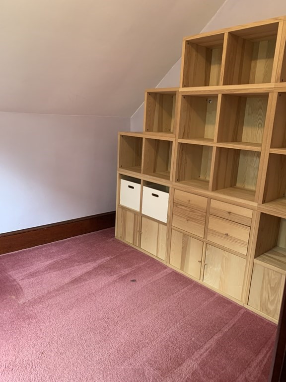 113 Howland Road Fairhaven, MA 02719 - Photo 11 of 13 a view of empty room with wooden floor