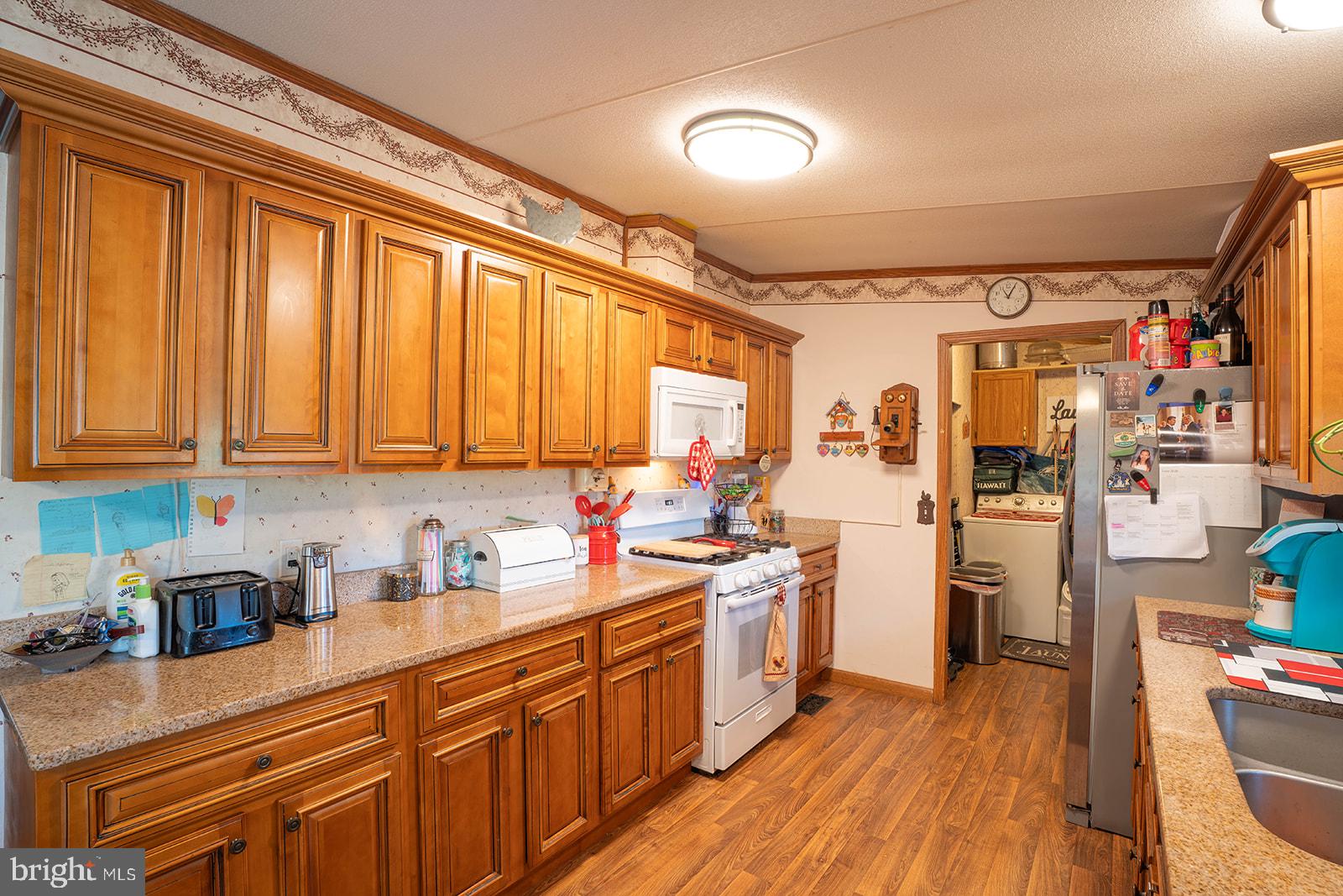 940 Willow Grove Road Monroeville, NJ 08343 - Photo 3 of 22 Warm wooden kitchen with modern charm.