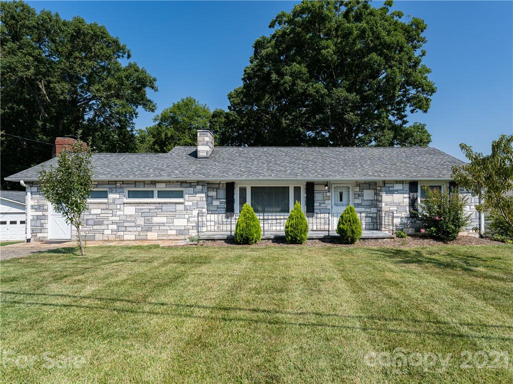 298 Erwin Hills Road Asheville, NC 28806 - Photo 2 of 48 a view of a house with garden and yard