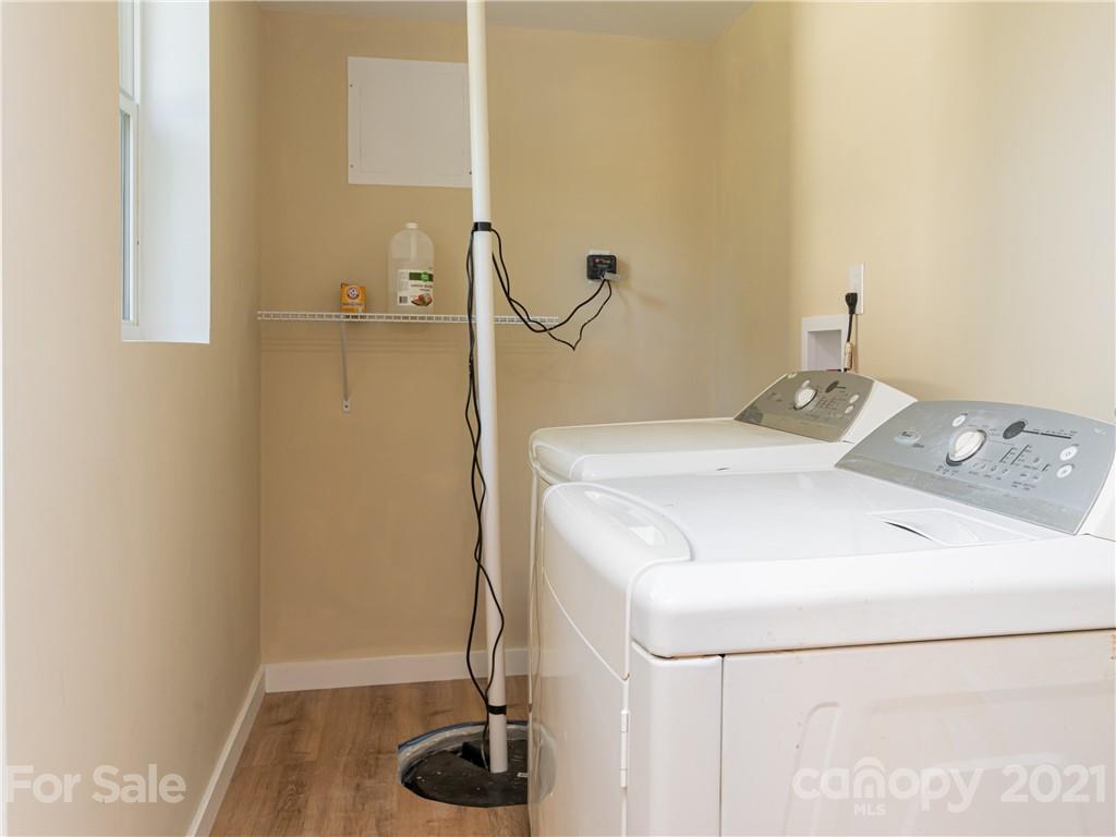 298 Erwin Hills Road Asheville, NC 28806 - Photo 21 of 48 a bathroom with a sink and a shower