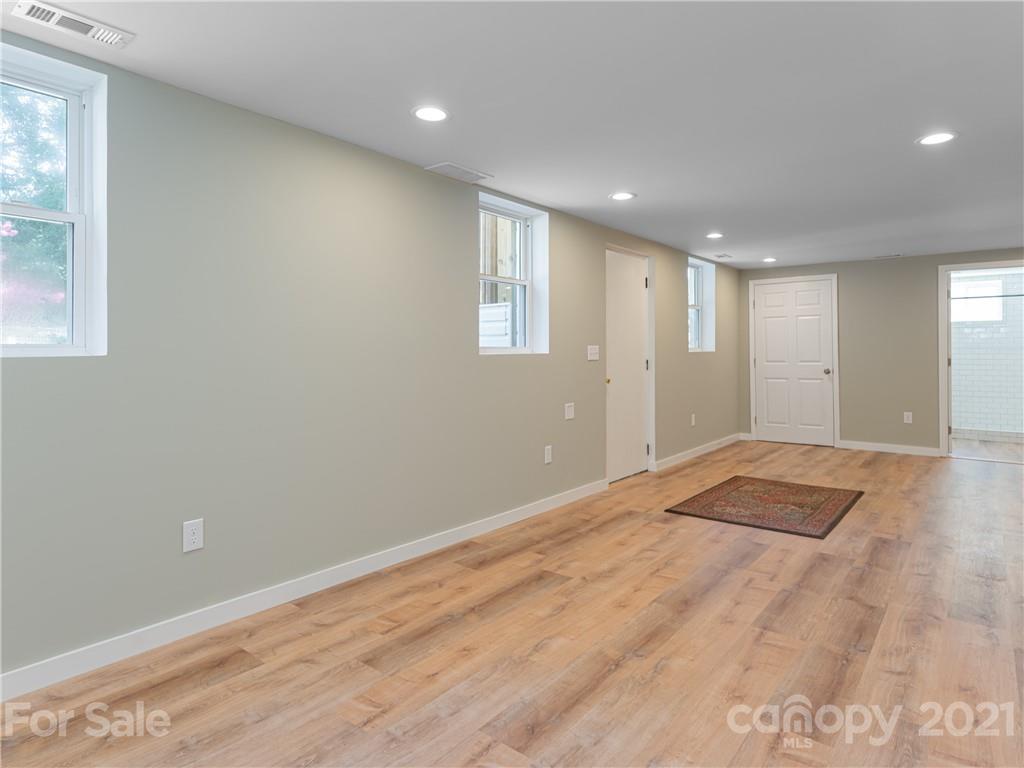 298 Erwin Hills Road Asheville, NC 28806 - Photo 27 of 48 a view of an empty room