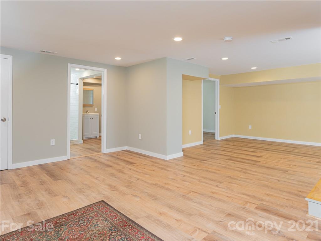 298 Erwin Hills Road Asheville, NC 28806 - Photo 28 of 48 a view of an empty room