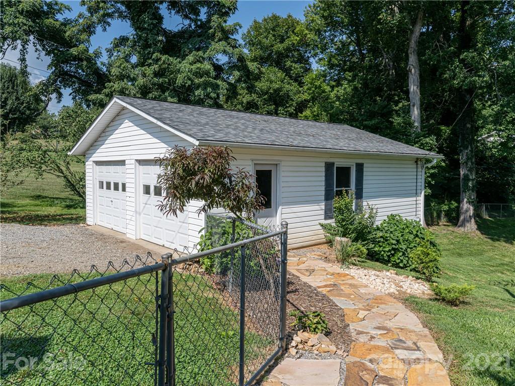 298 Erwin Hills Road Asheville, NC 28806 - Photo 39 of 48 a house view with a garden space