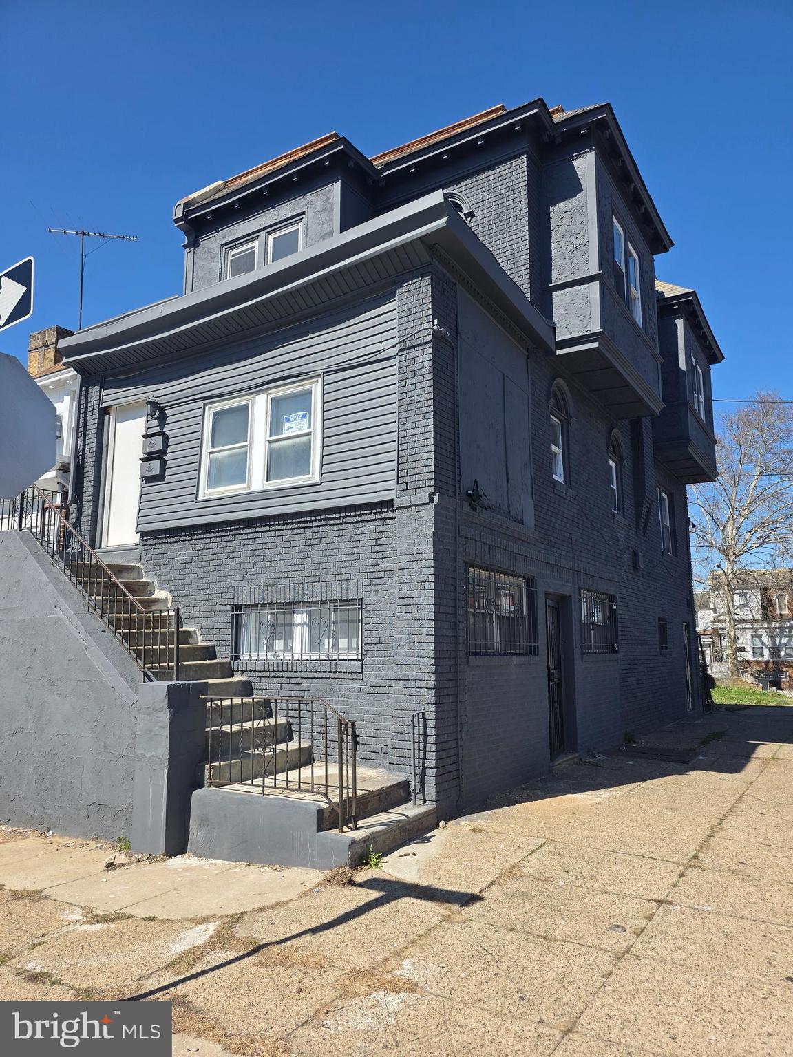 5901 Belmar Street, Unit 3 Philadelphia, PA 19143 - Photo 2 of 10 a view of a building with many windows