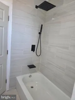 a bathroom with a bathtub