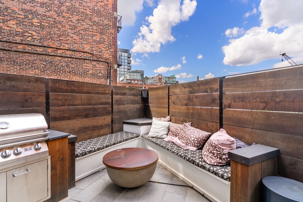 53 Snow Hill Street Boston, MA 02113 - Photo 6 of 35 a outdoor living space with furniture