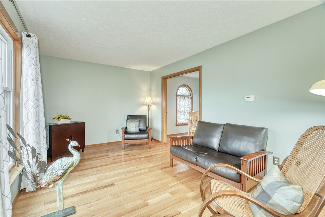 5907 Arbor Road Ontario, NY 14519 - Photo 33 of 50 Living Room with pocket doors to Dining room