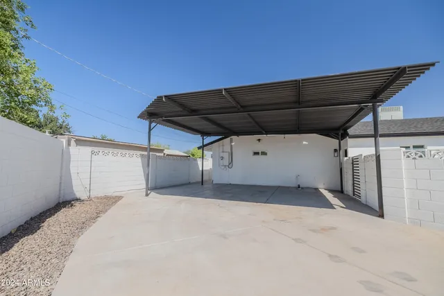 a view of a garage with wooden floor