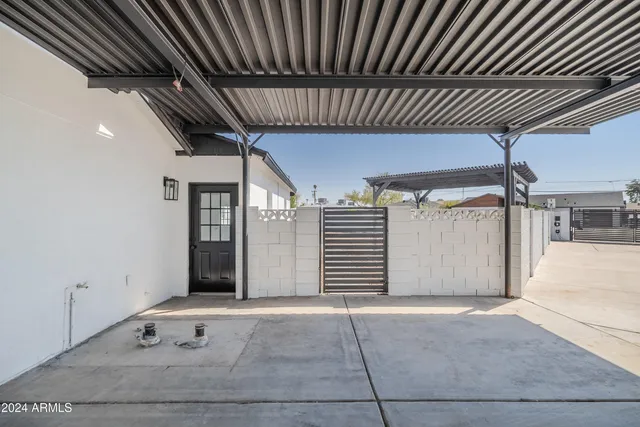 a view of a terrace with chairs