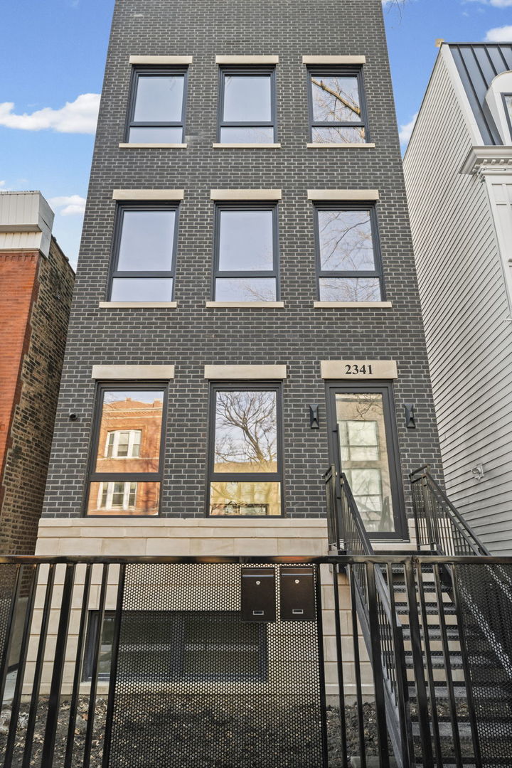 a view of front door of stairs