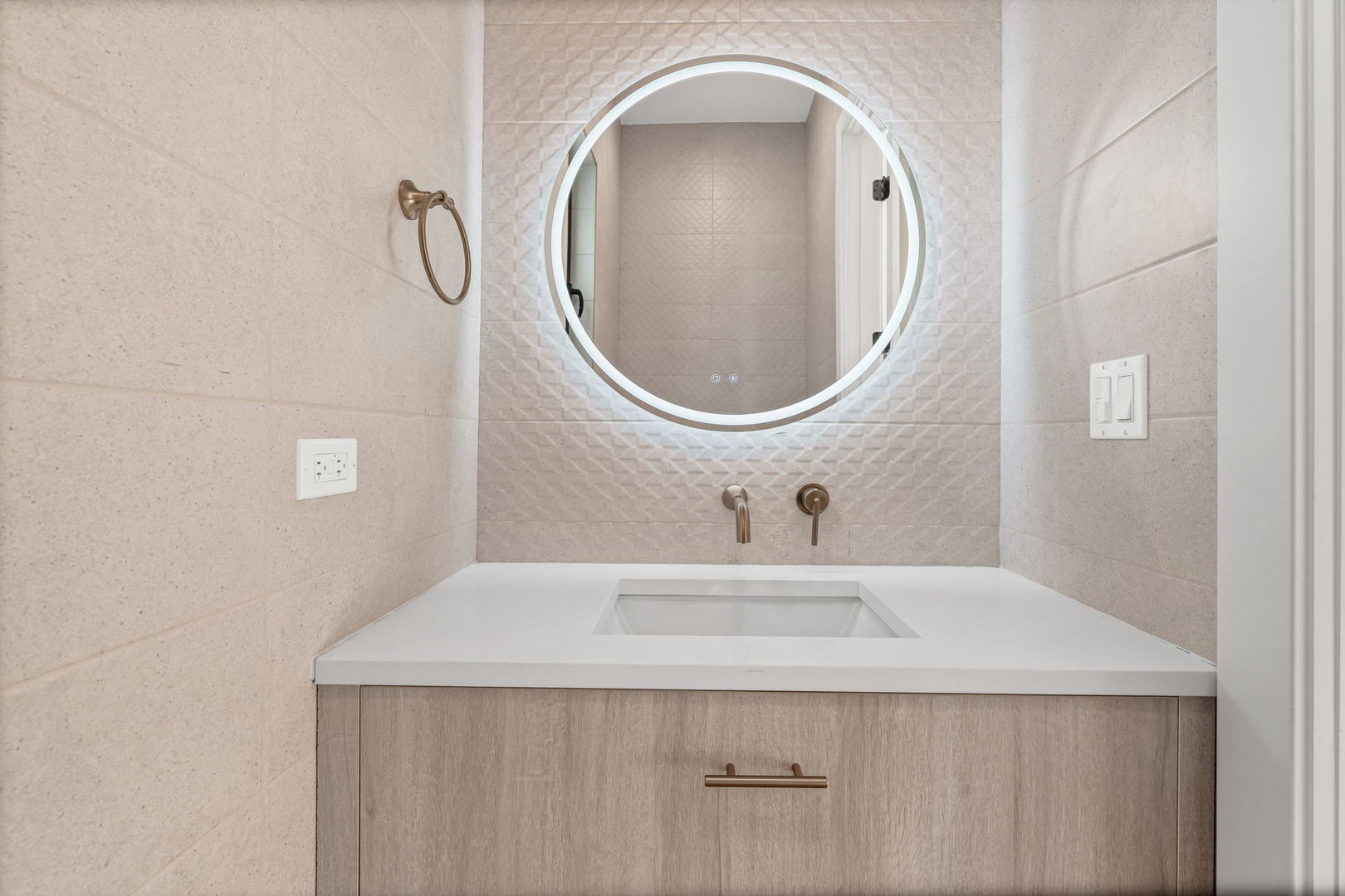 2341 West Belden Avenue, Unit 1 Chicago, IL 60647 - Photo 9 of 24 a bathroom with a sink and a mirror