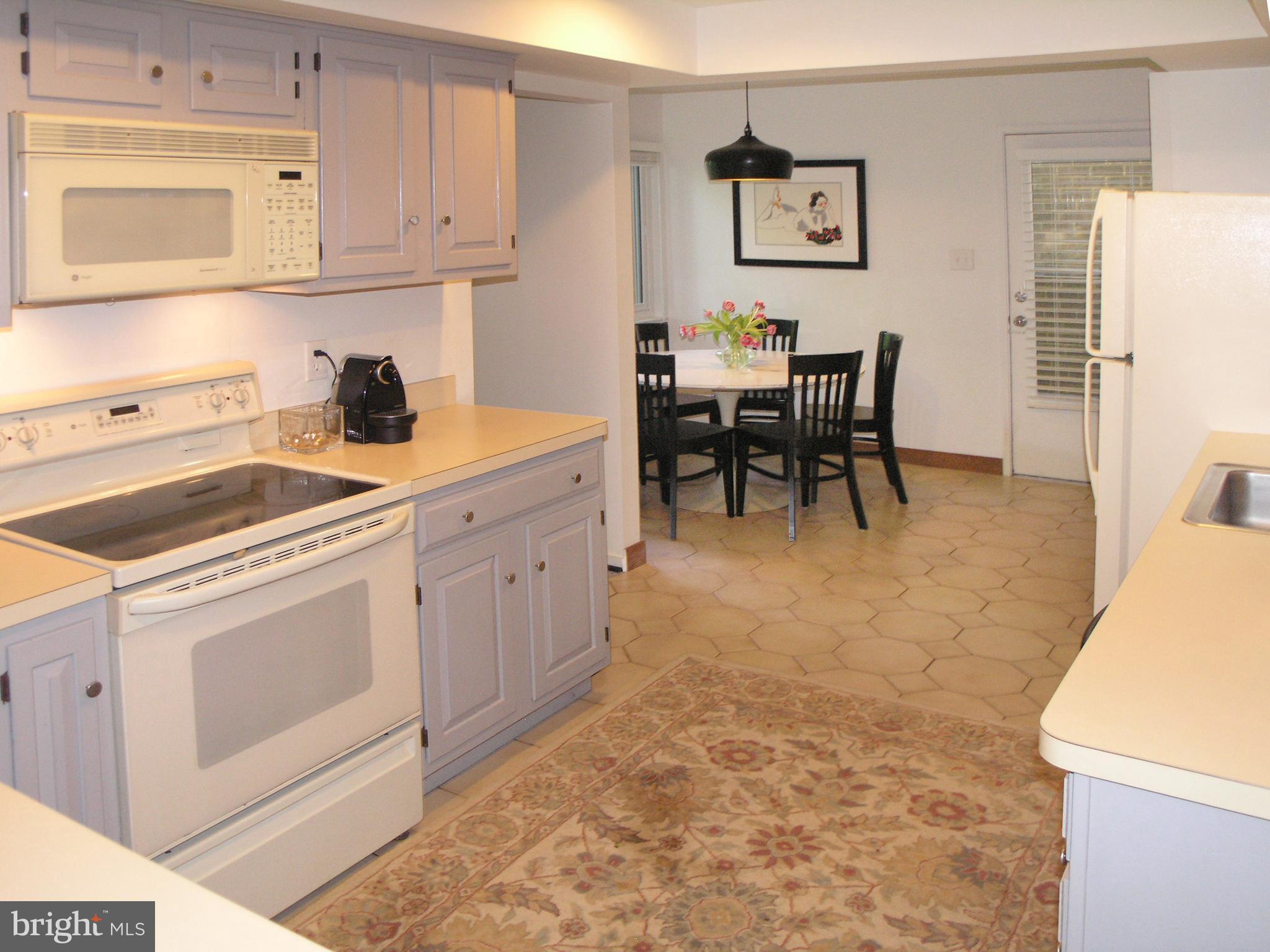 1622 Greenbriar Court Reston, VA 20190 - Photo 12 of 30 Kitchen thru to Breakfast Nook and Side Door