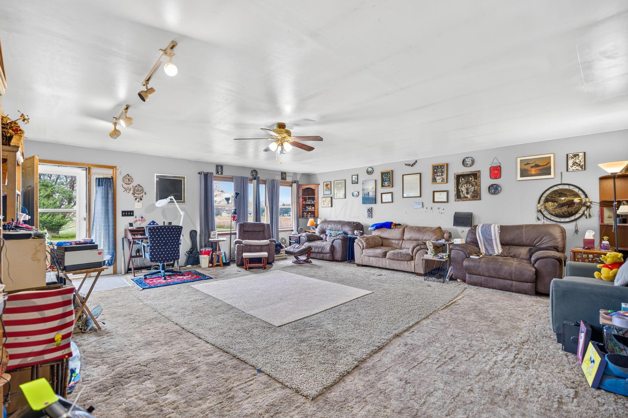4780 North Section Line Road Radnor, OH 43066 - Photo 13 of 79 Spacious interior with neutral wall colors and ceiling fan