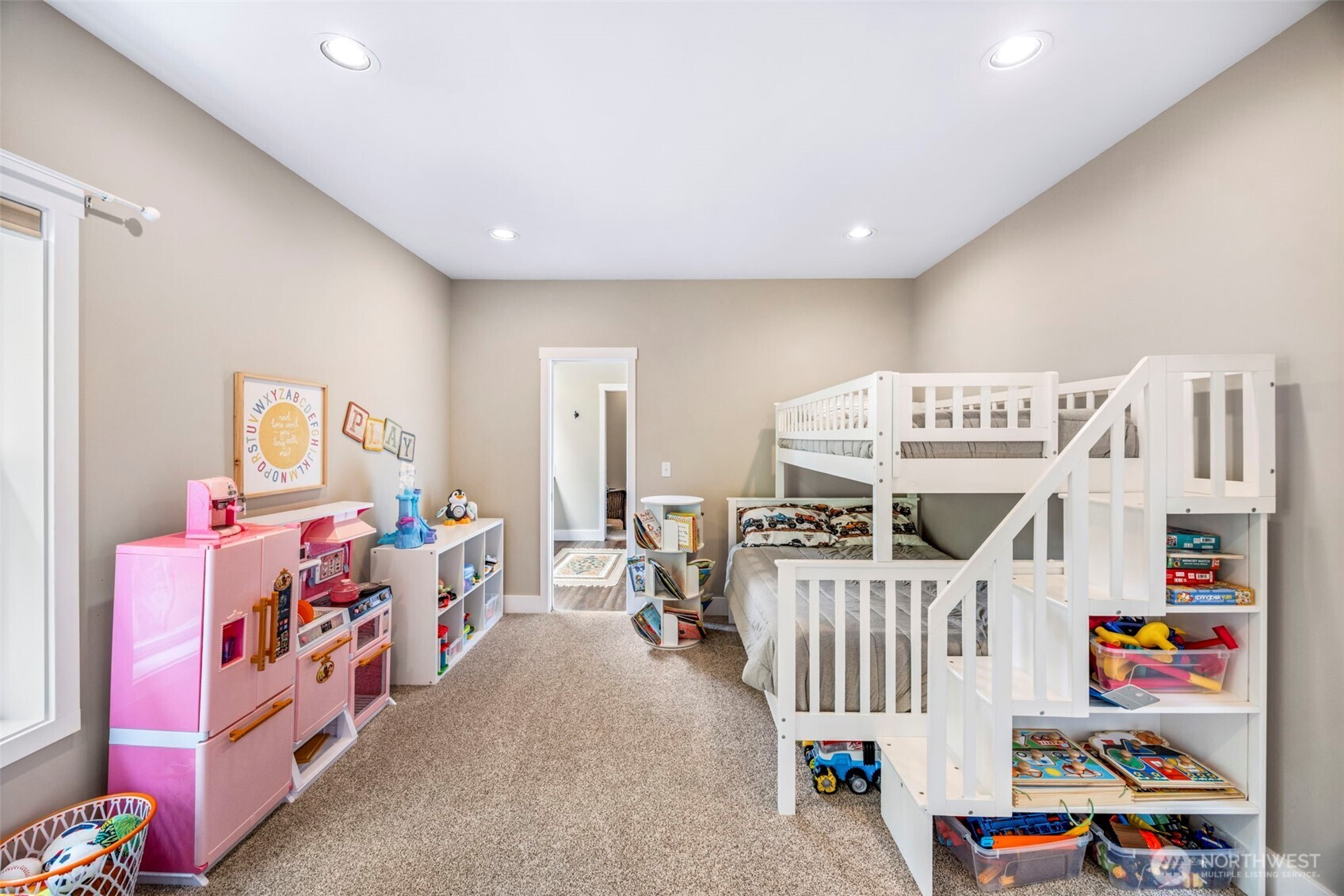 6591 Northeast North Shore Road Belfair, WA 98528 - Photo 32 of 37 a kids room with bed gym equipment and a large window