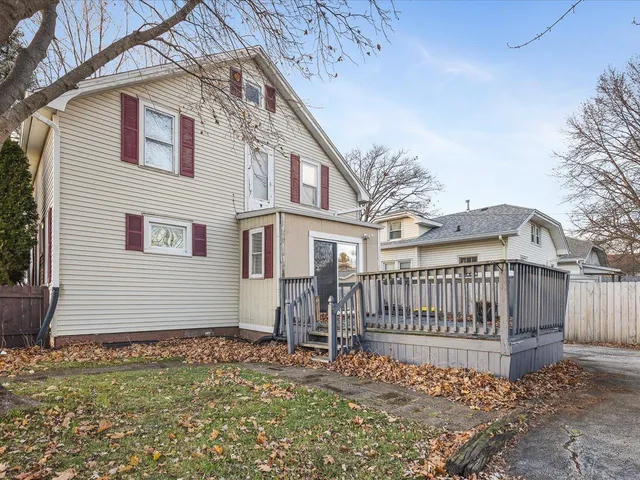 a view of a house with a fence