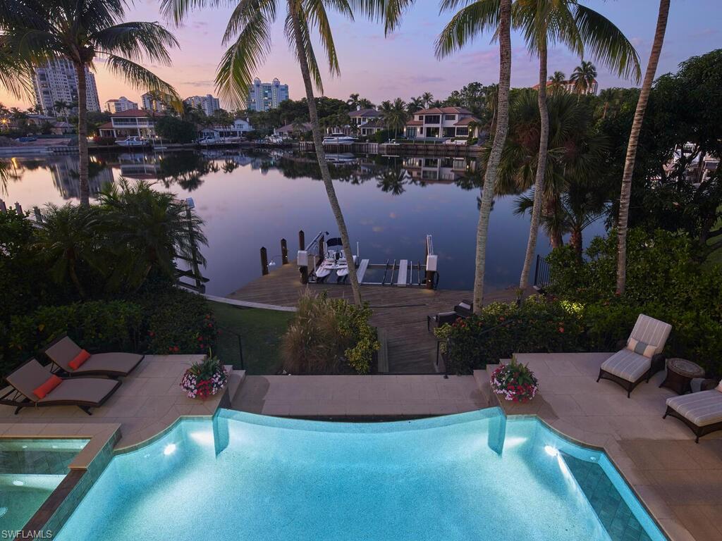 377 Pirates Bight Naples, FL 34103 - Photo 3 of 44 a view of a terrace with sitting area