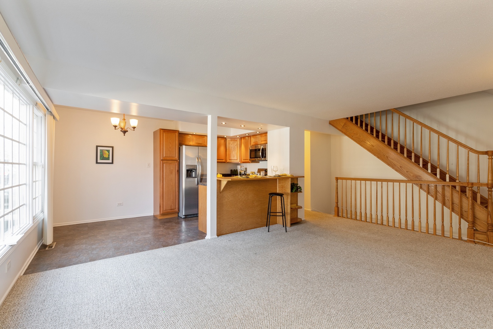 1446 Inverrary Lane, Unit 1446 Deerfield, IL 60015 - Photo 3 of 13 an empty room with windows