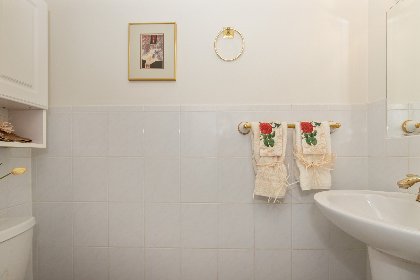 1446 Inverrary Lane, Unit 1446 Deerfield, IL 60015 - Photo 7 of 13 a bathroom with a sink and a shower curtain