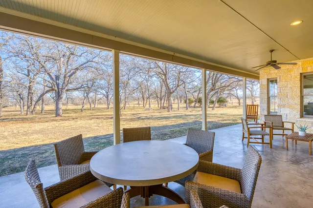 a view of swimming pool with a yard
