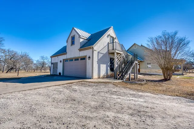 a view of a garage with furniture