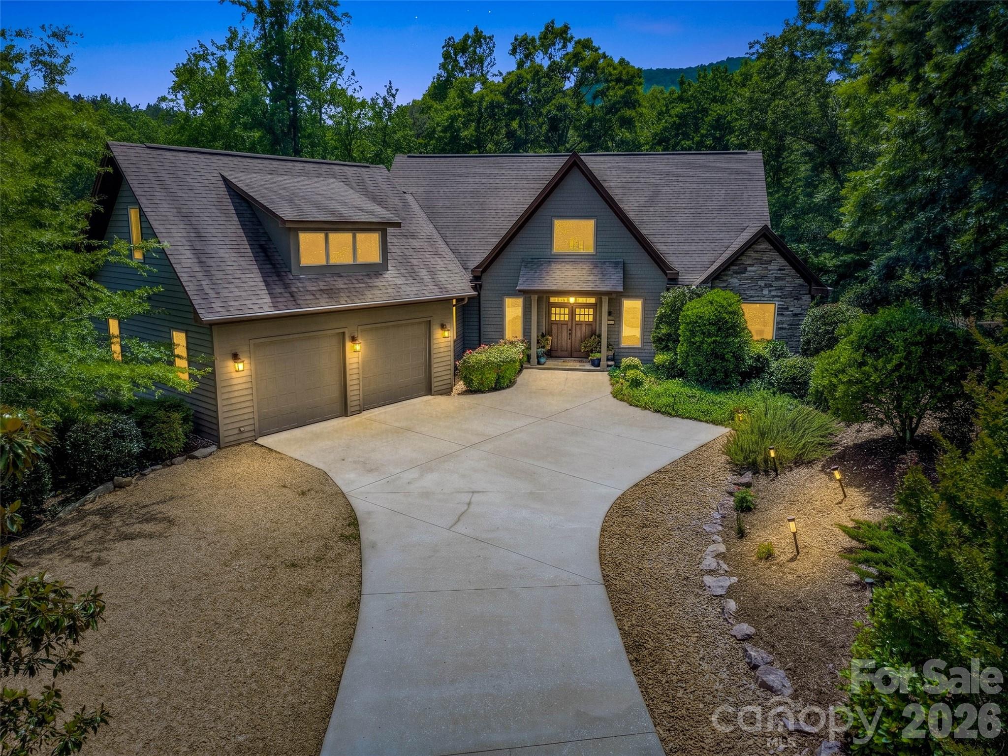 120 Glenn Court Mill Spring, NC 28756 - Photo 1 of 48 a front view of a house with a yard