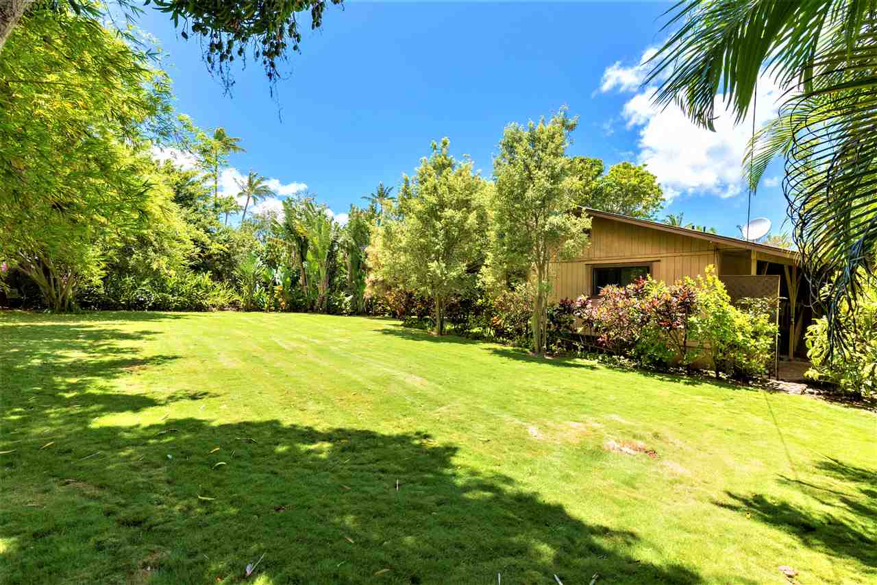 4025 Lower Honoapiilani Road Lahaina, HI 96761 - Photo 13 of 21 a view of a backyard with a garden