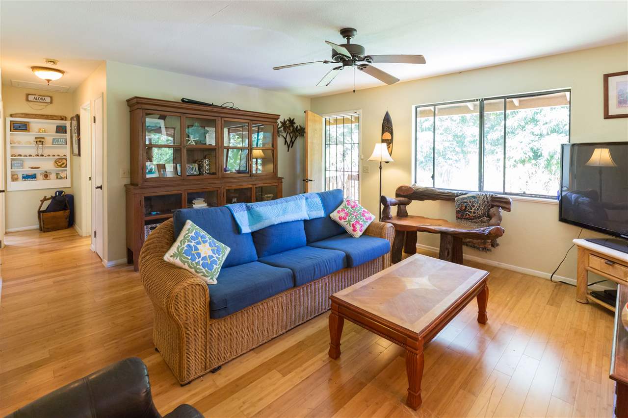 4025 Lower Honoapiilani Road Lahaina, HI 96761 - Photo 14 of 21 a living room with furniture and a flat screen tv