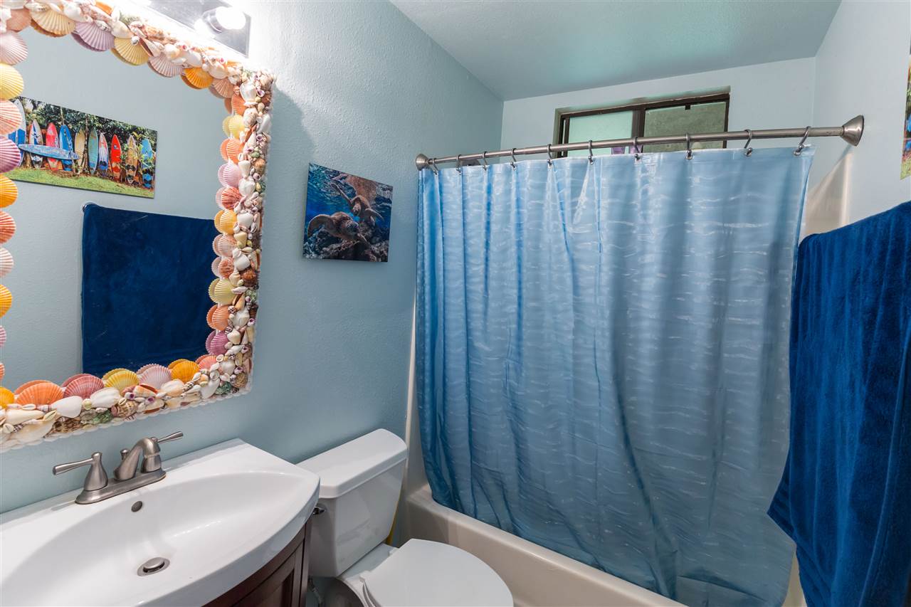 4025 Lower Honoapiilani Road Lahaina, HI 96761 - Photo 17 of 21 a bathroom with a sink and a mirror