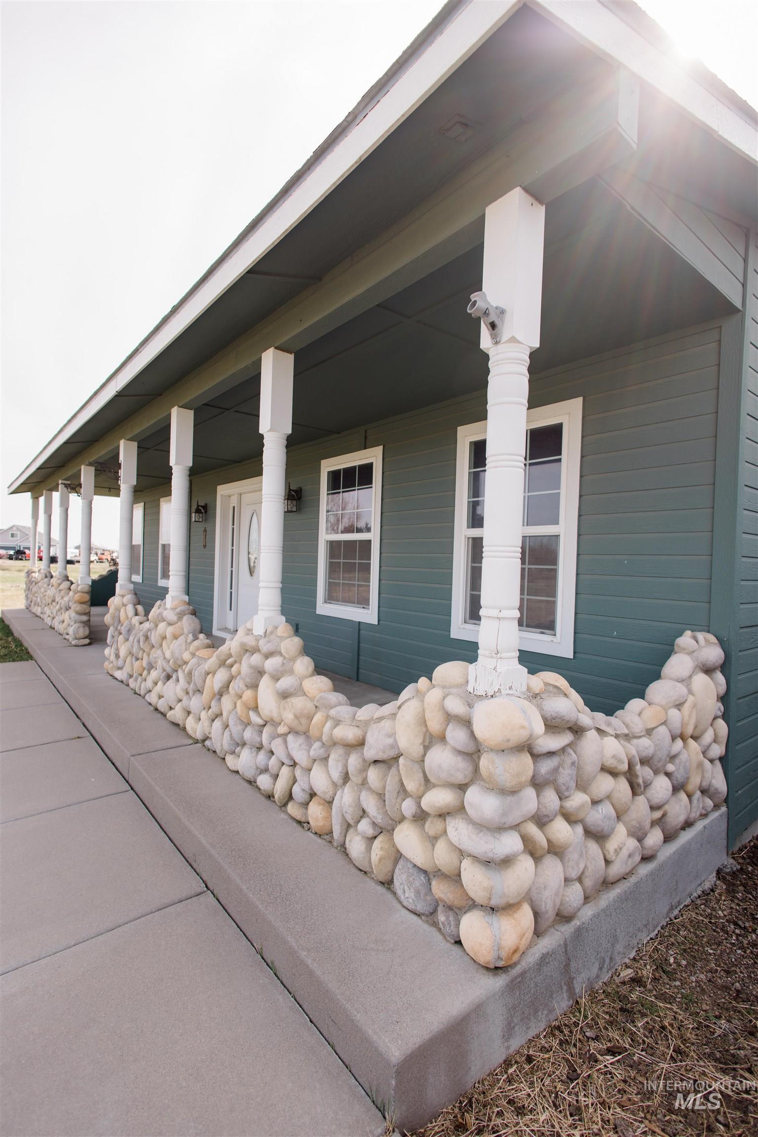 1571 Southeast Hamilton Road Mountain Home, ID 83647 - Photo 38 of 50 Entrance to property featuring covered porch