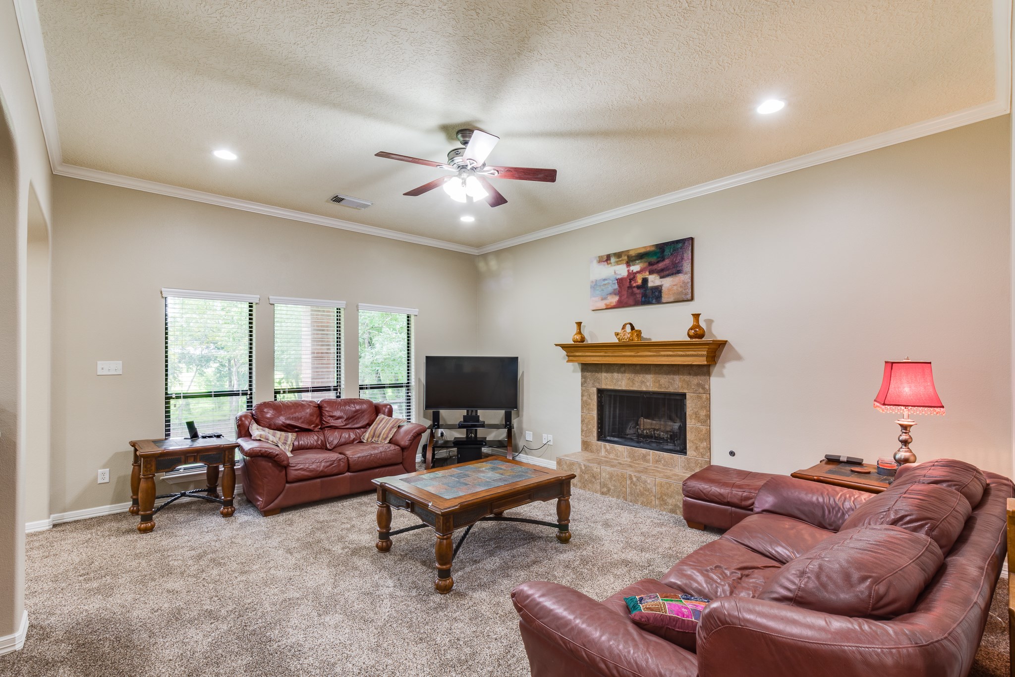 507 Oaks Grande Road Baytown, TX 77523 - Photo 11 of 50 a living room with furniture and a fireplace