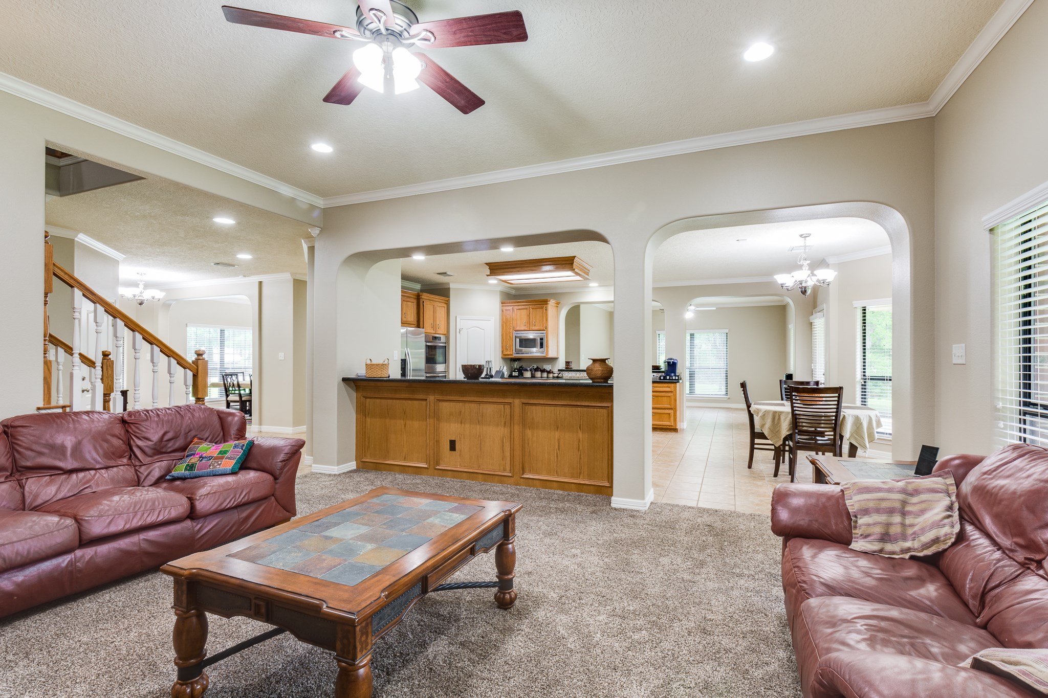 507 Oaks Grande Road Baytown, TX 77523 - Photo 13 of 50 a living room with furniture and a view of kitchen