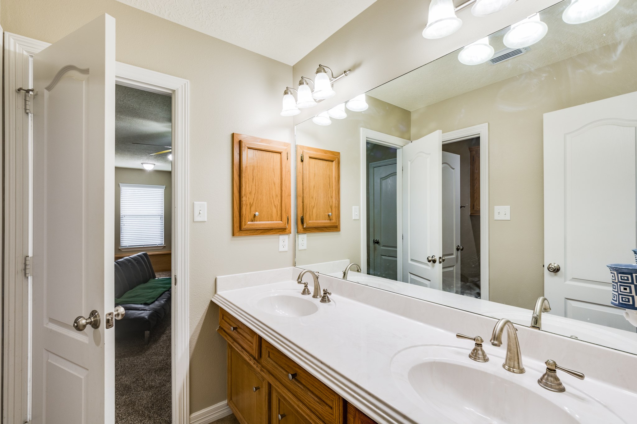 507 Oaks Grande Road Baytown, TX 77523 - Photo 34 of 50 a bathroom with a sink and a mirror